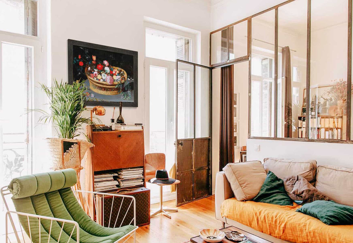 A Basket With Spring Flowers On A Stone Table by Jan Brueghel The Younger