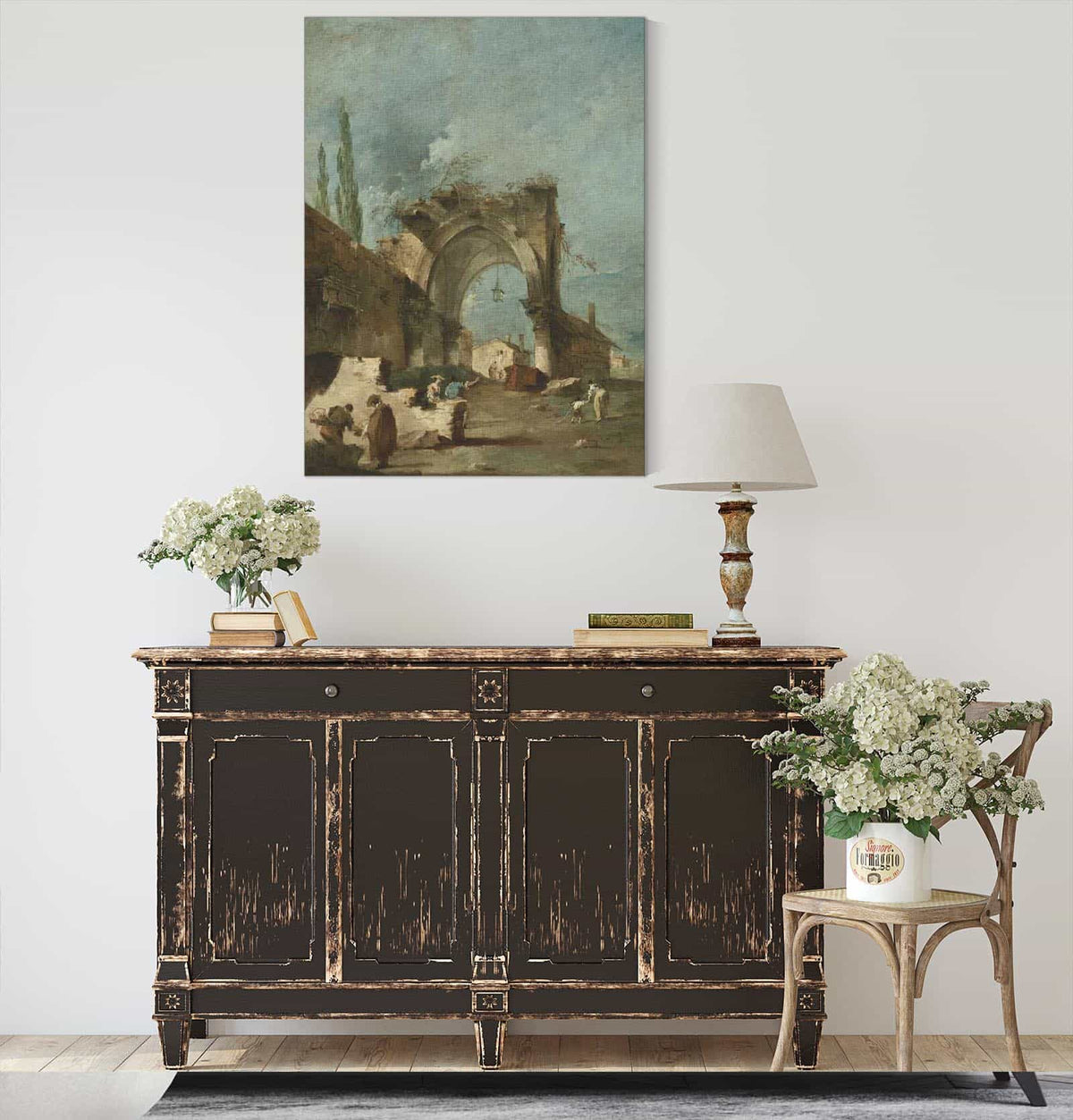 A Capriccio Of Buildings With Figures By A Ruined Arch by Francesco Guardi