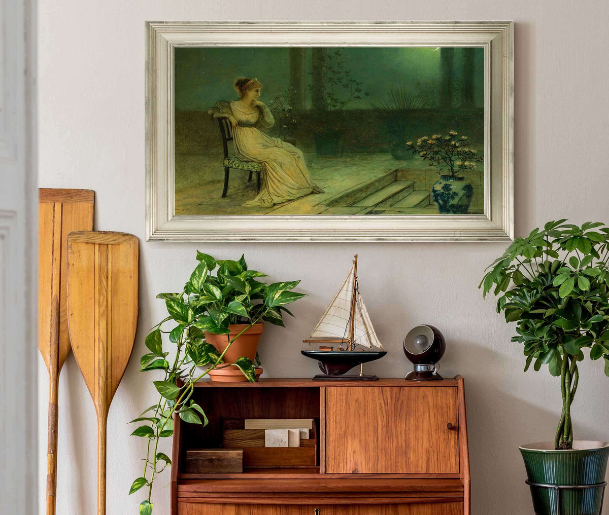 A Classical Maiden Seated On A Terrace By Moonlight by John Atkinson Grimshaw