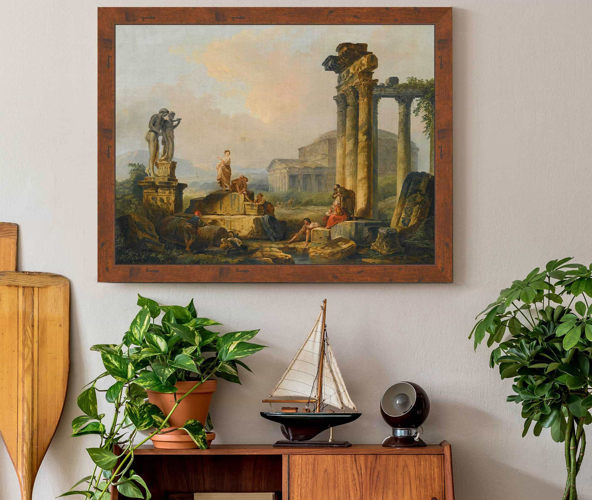 A Landscape With Shepherds And Shepherdesses Among Ancient Ruins by Hubert Robert