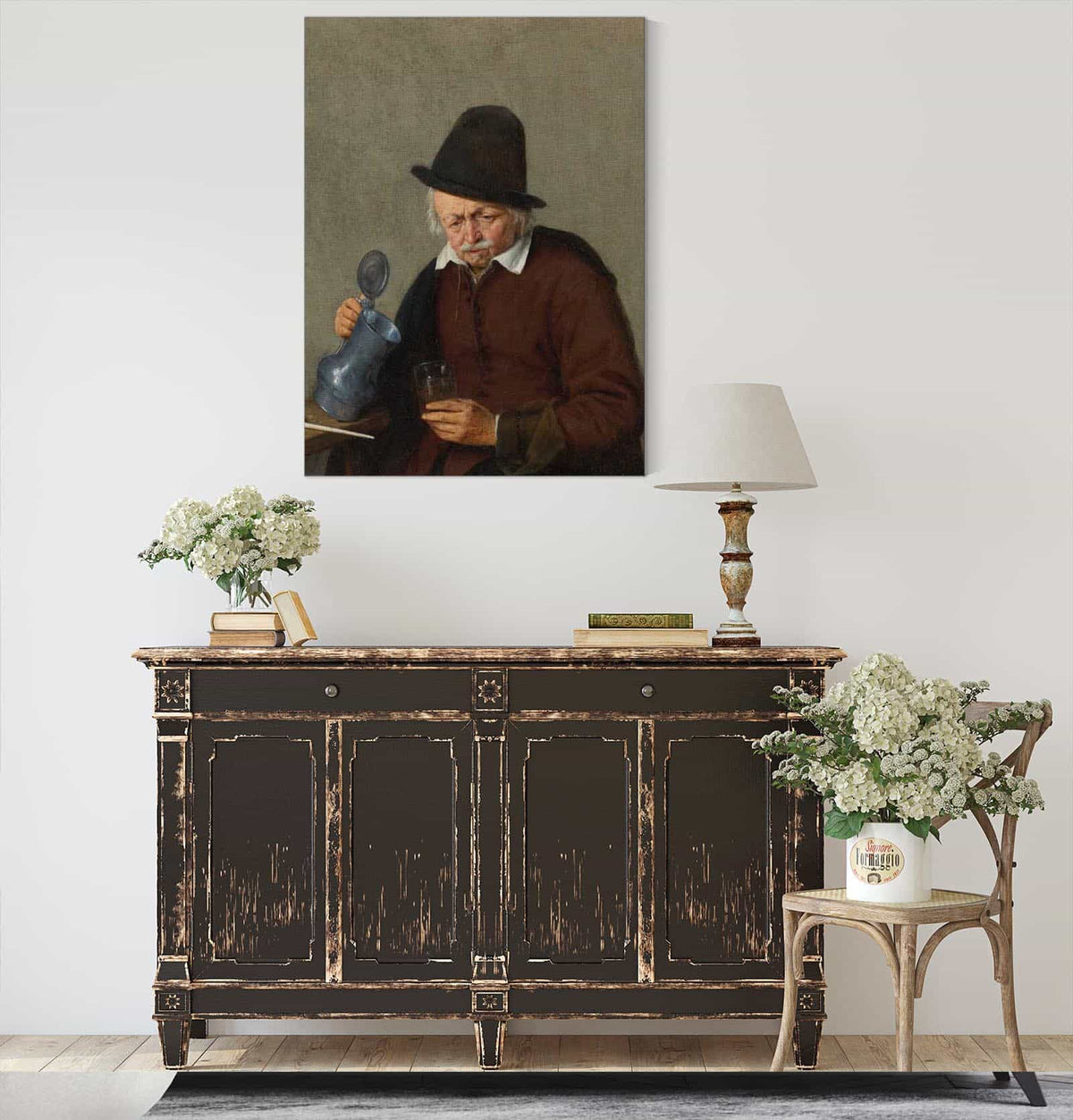 A Man Holding A Tankard And A Glass by Adriaen Van Ostade