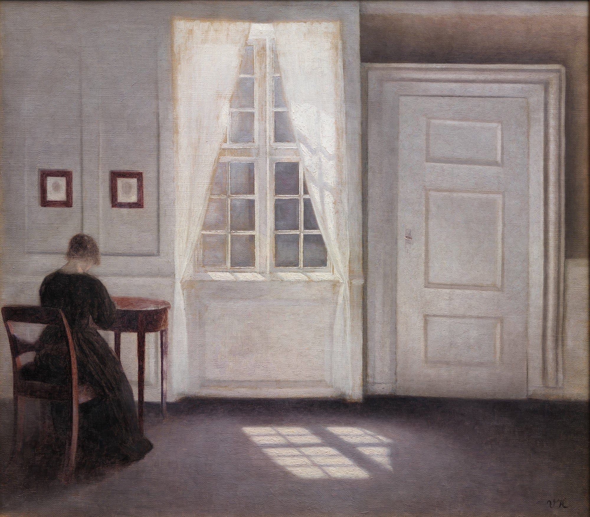 A Room In The Artists Home In Strandgade Copenhagen With The Artists Wife by Vilhelm Hammershoi