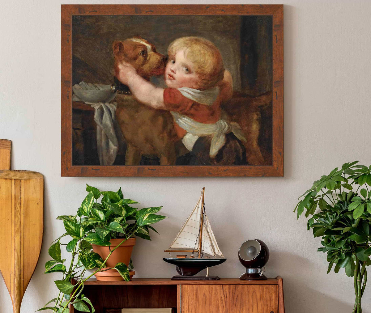 A Young Boy With A Dog by Jean Baptiste Greuze