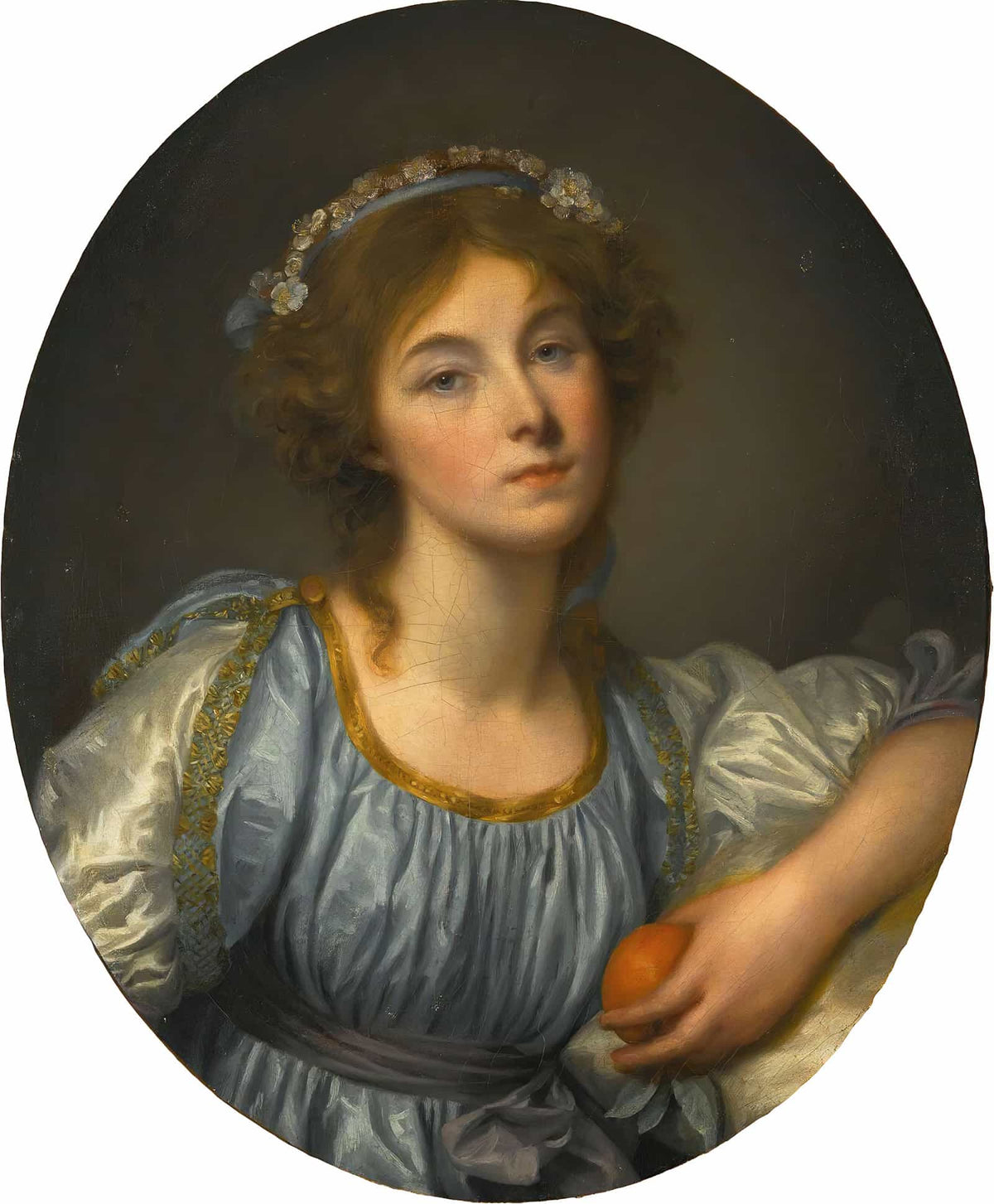 A Young Girl Holding An Orange by Jean Baptiste Greuze