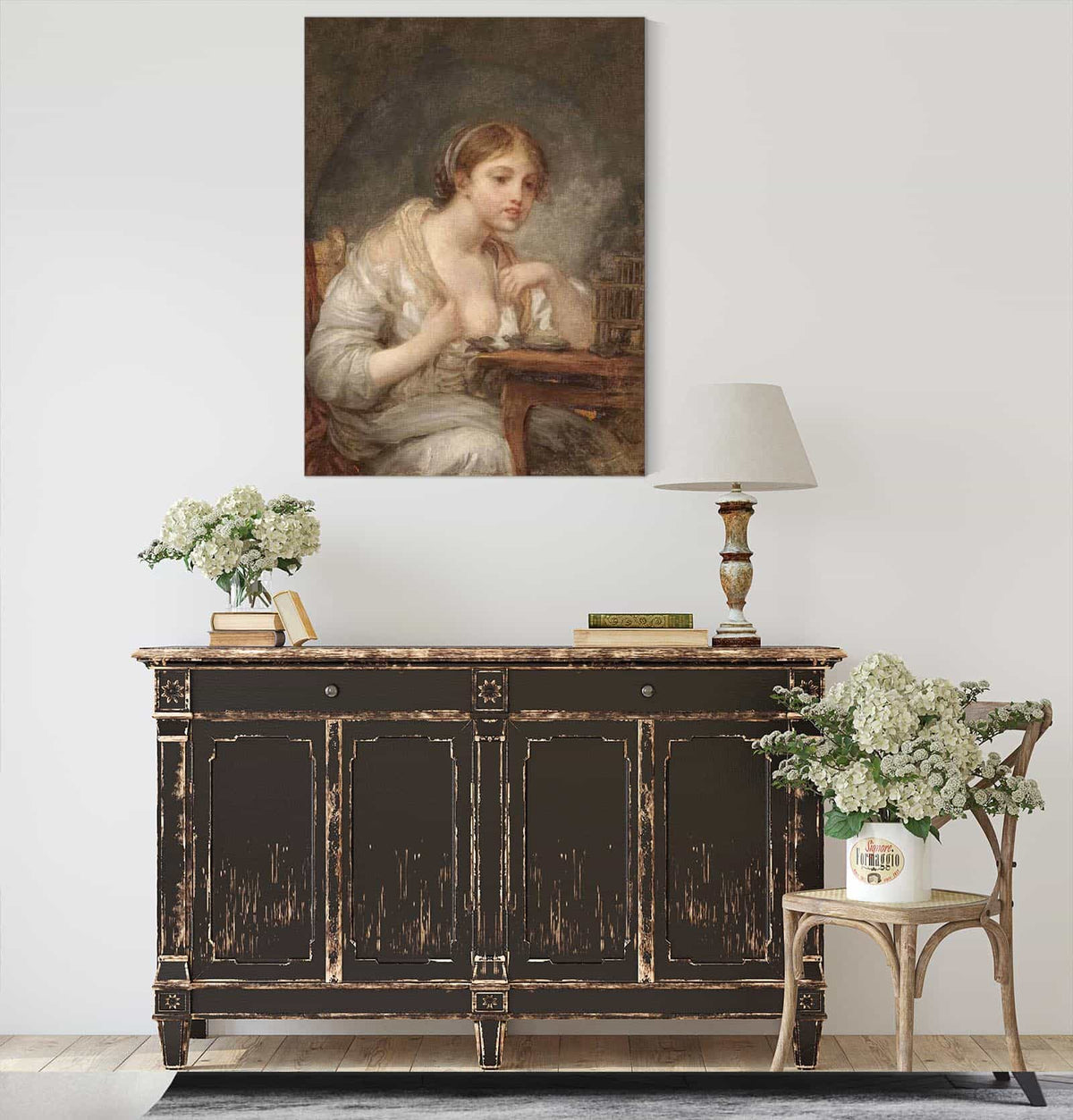 A Young Woman With A Birdcage by Jean Baptiste Greuze