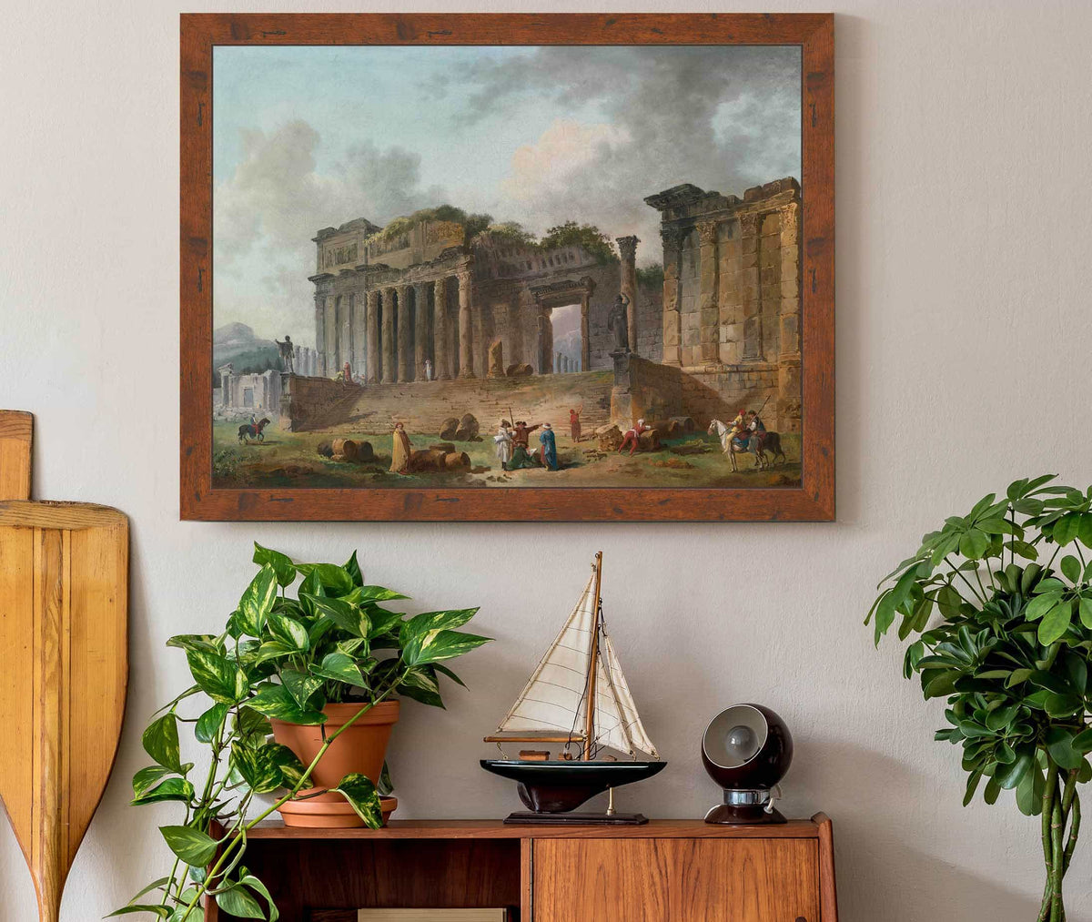 An Architectural Capriccio With An Artist Sketching In The Foreground by Hubert Robert