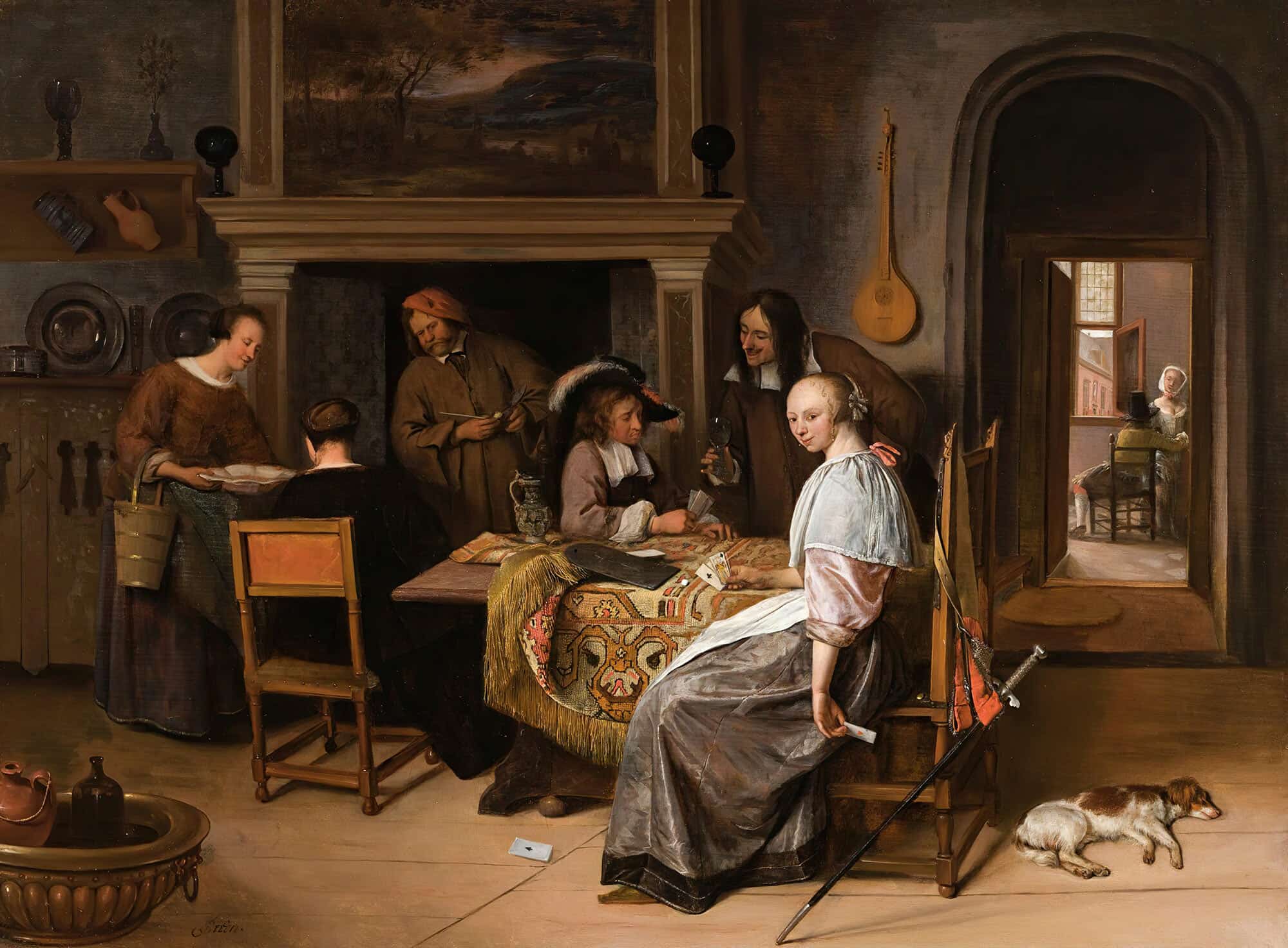 An Elegant Company In An Interior With Figures Playing Cards At A Table by Jan Steen