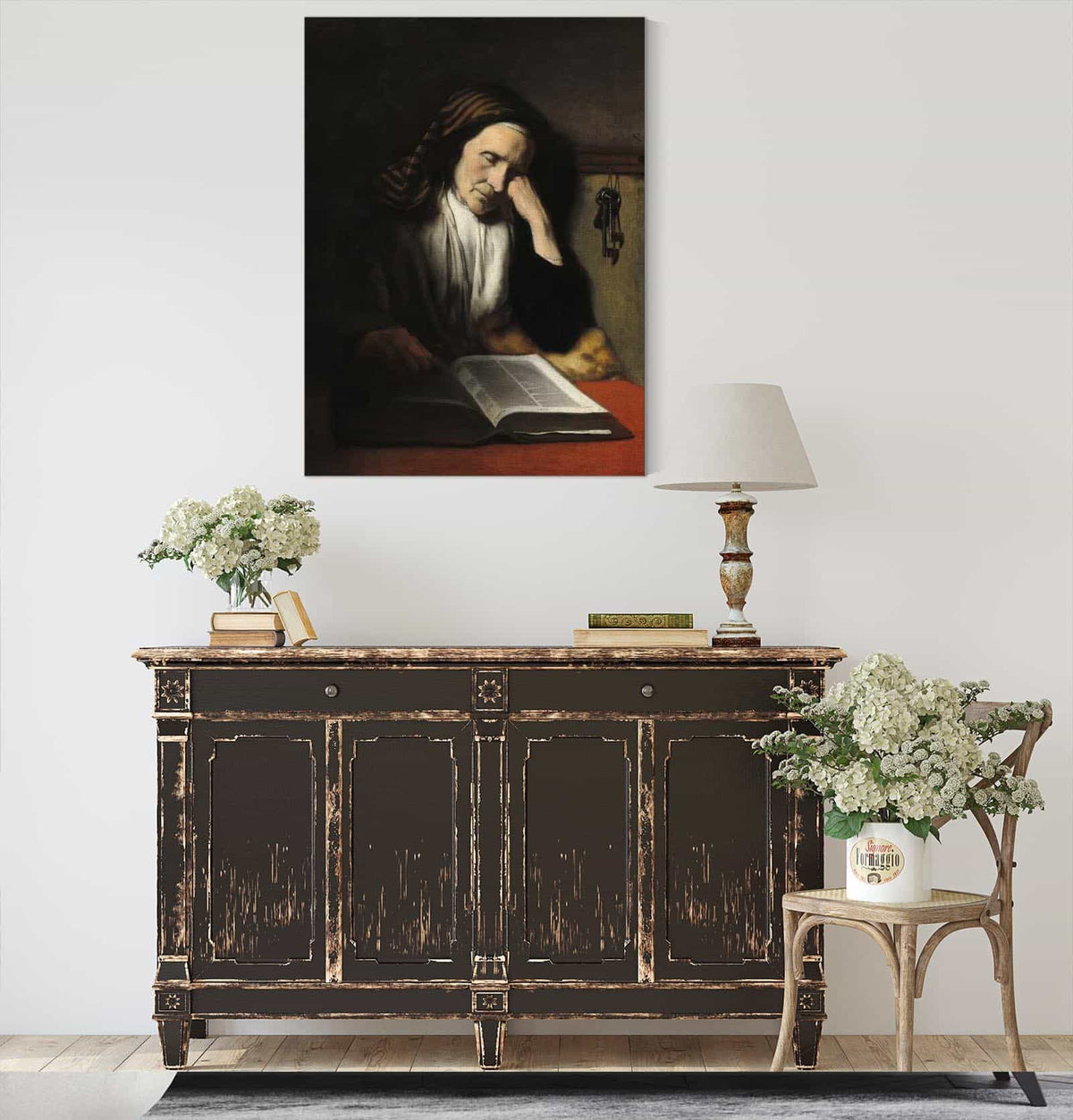 An Old Woman Dozing Over A Book by Nicolaes Maes