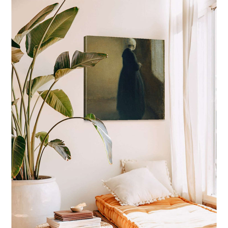 An Old Woman Standing By A Window by Vilhelm Hammershoi