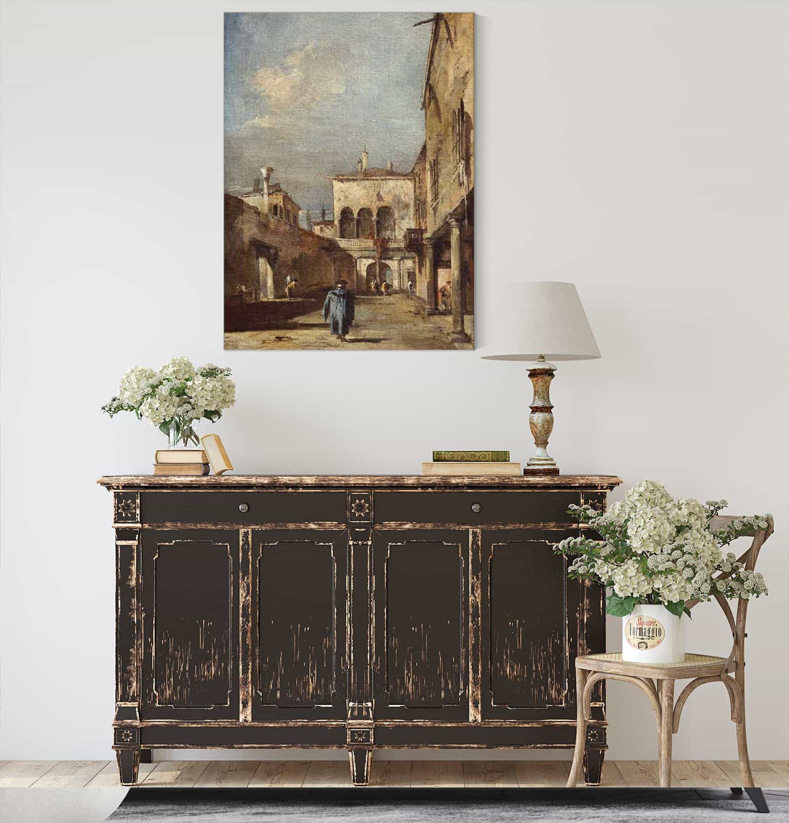 Architectural Fantasy With A Courtyard by Francesco Guardi