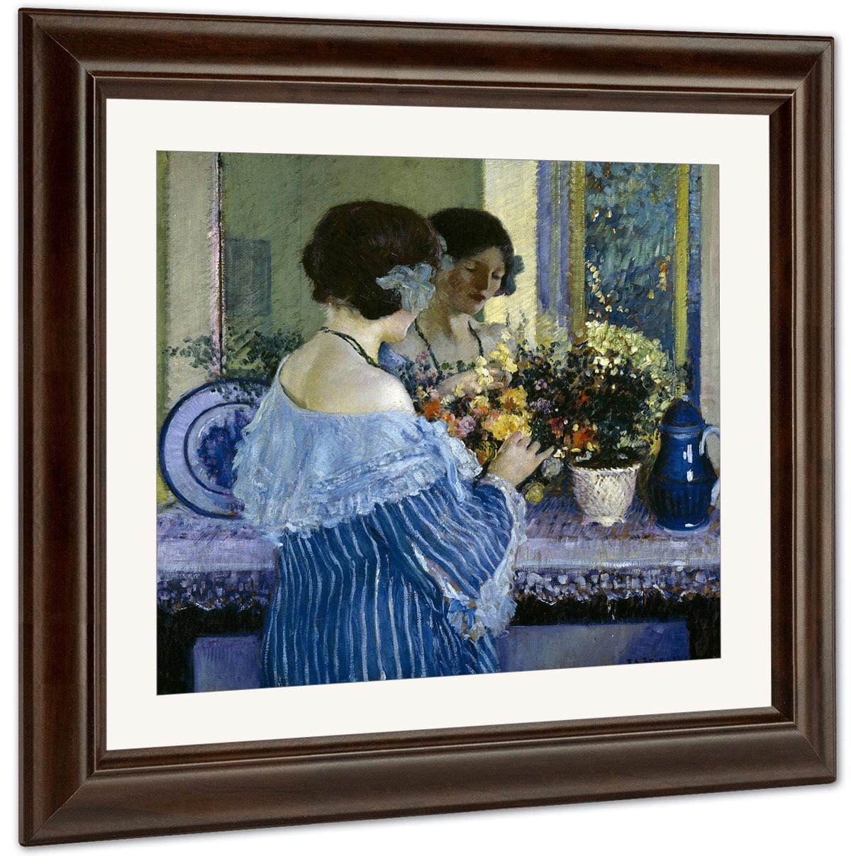 Girl In Blue Arranging Flowers By Frederick Carl Frieseke Fine Art Print