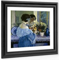 Girl In Blue Arranging Flowers By Frederick Carl Frieseke Fine Art Print