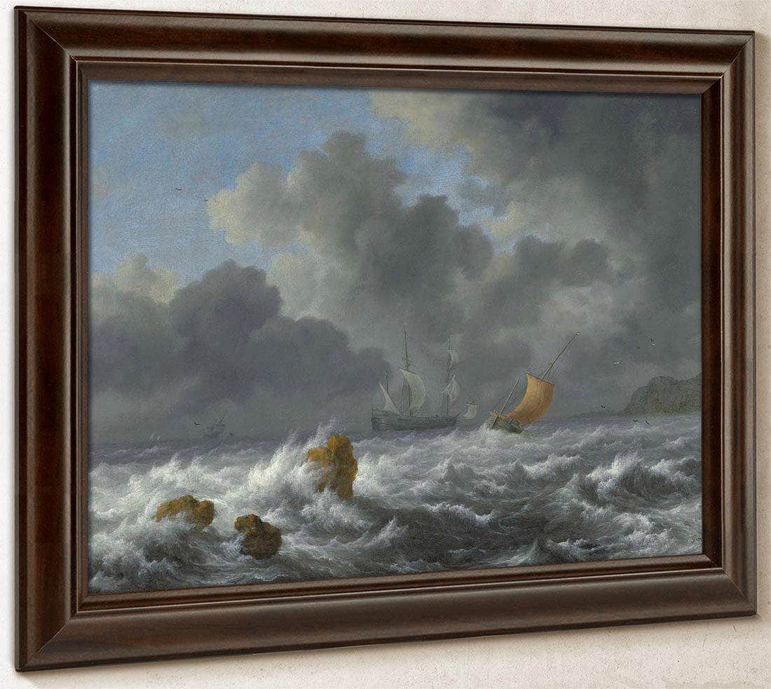Sailing Vessels In A Stormy Sea Near A Rocky Coast By Jacob Van Ruisdael Fine Art Print