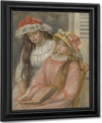 Young Girls Looking At An Album By Pierre Auguste Renoir Fine Art Print