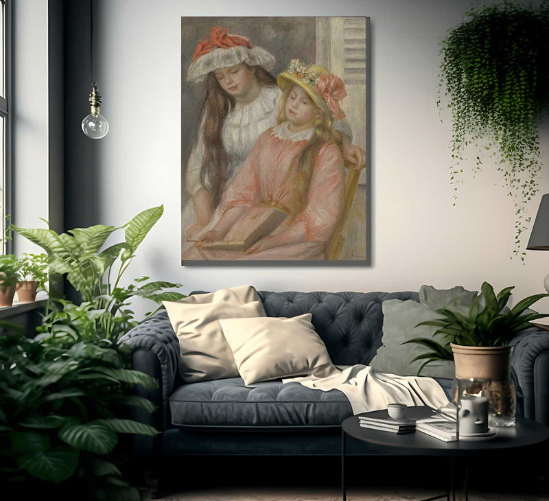 Young Girls Looking At An Album By Pierre Auguste Renoir Fine Art Print