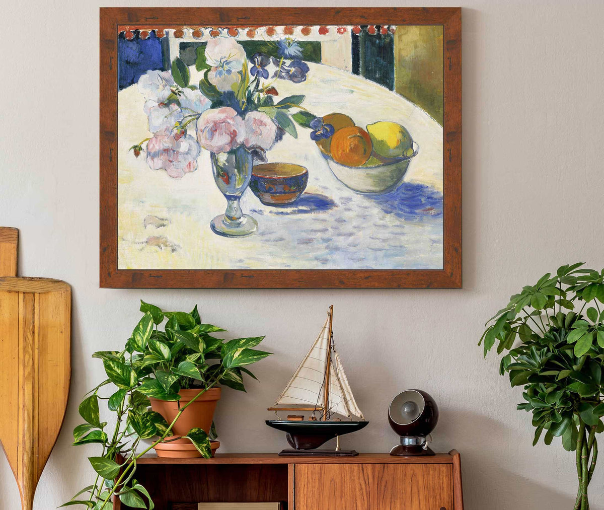 Flowers And A Bowl Of Fruit On A Table by Paul Gauguin