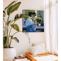 Girl In Blue Arranging Flowers by Frederick Carl Frieseke