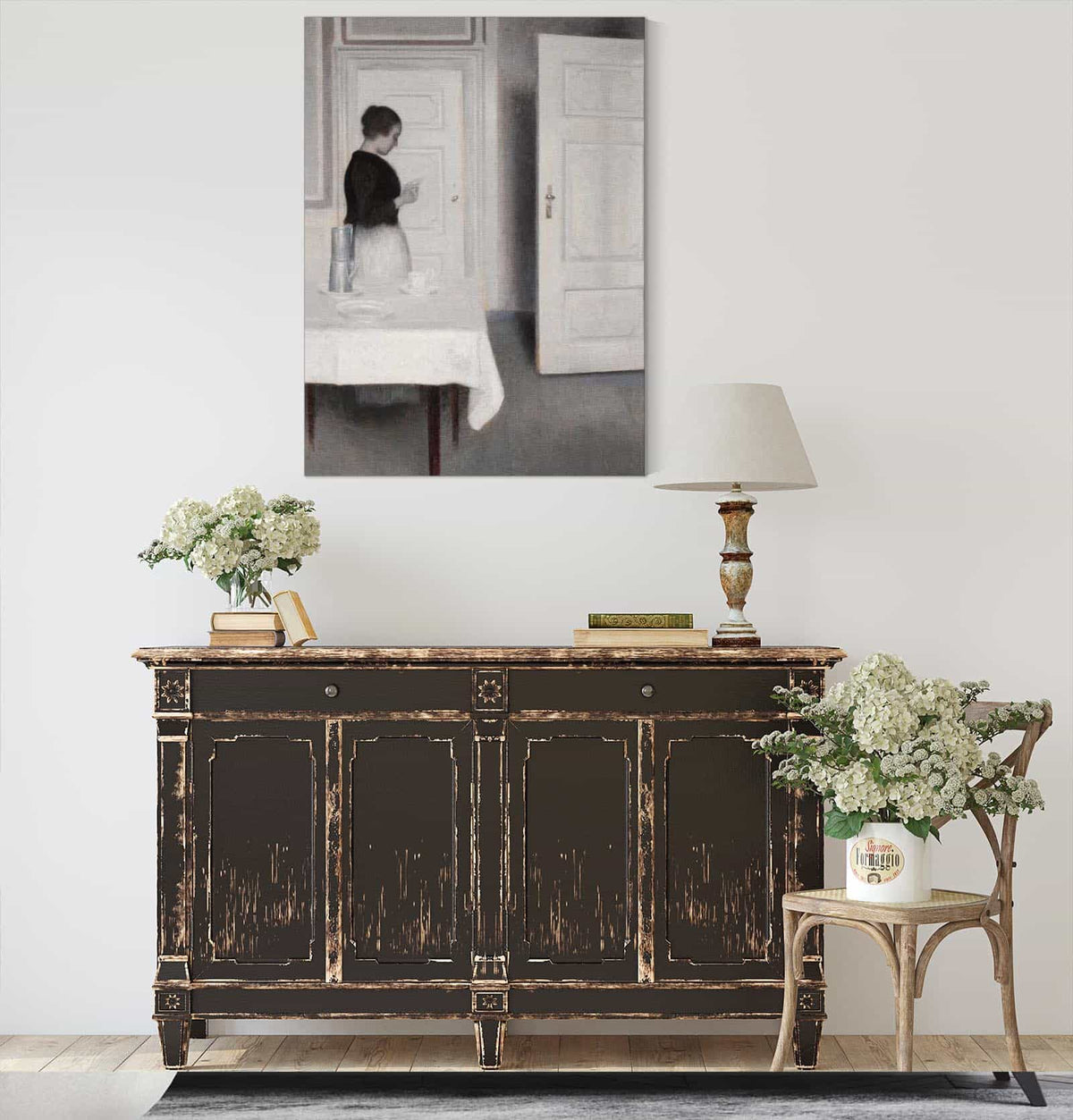 Ida Reading A Letter by Vilhelm Hammershoi