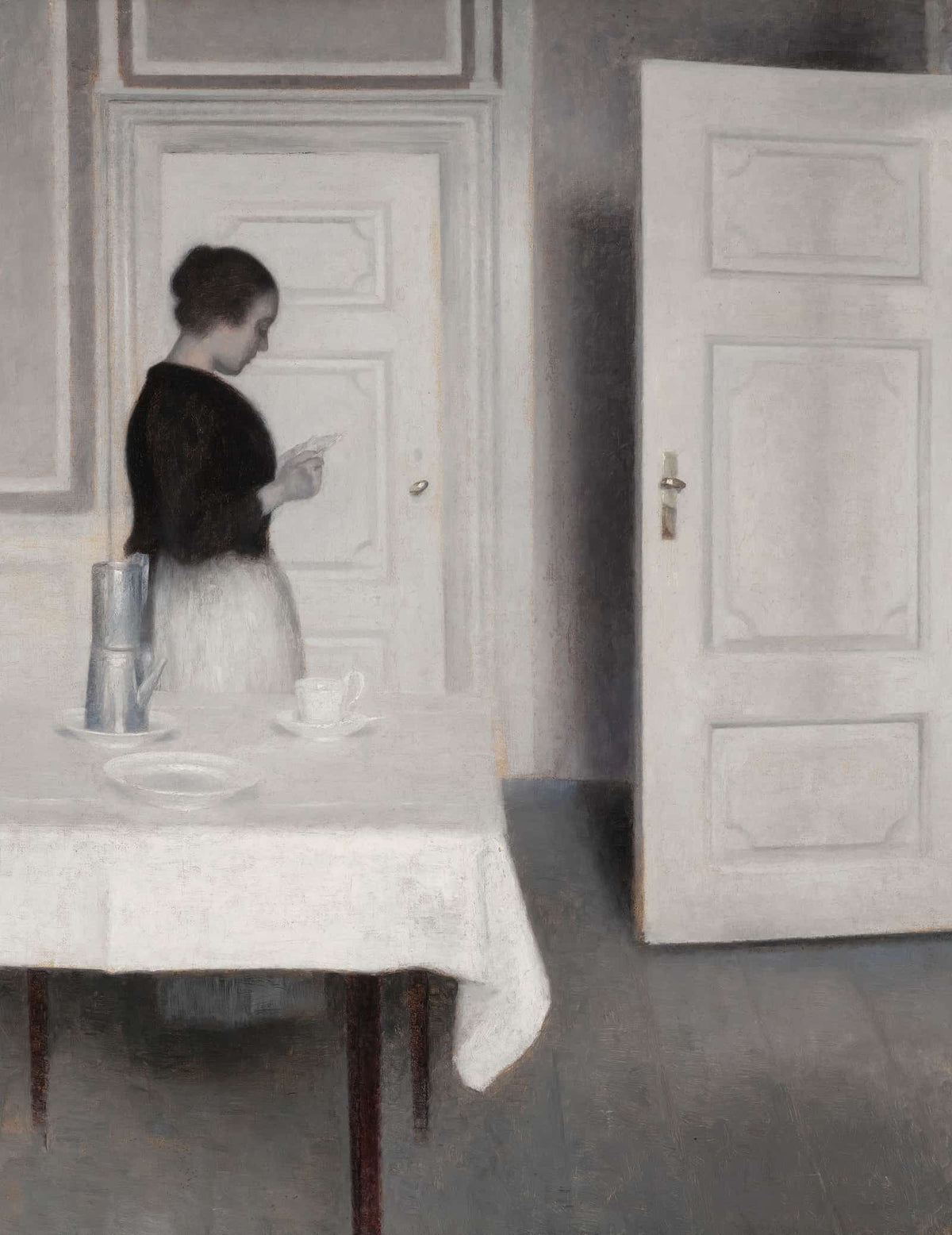 Ida Reading A Letter by Vilhelm Hammershoi