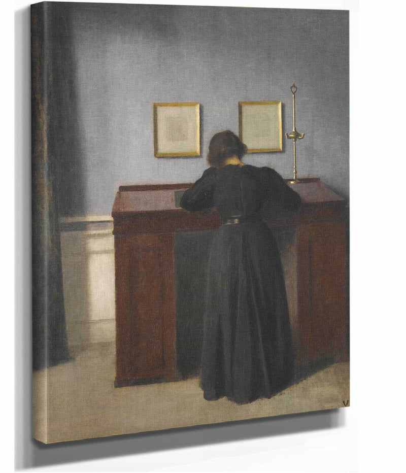Ida Standing At A Desk by Vilhelm Hammershoi