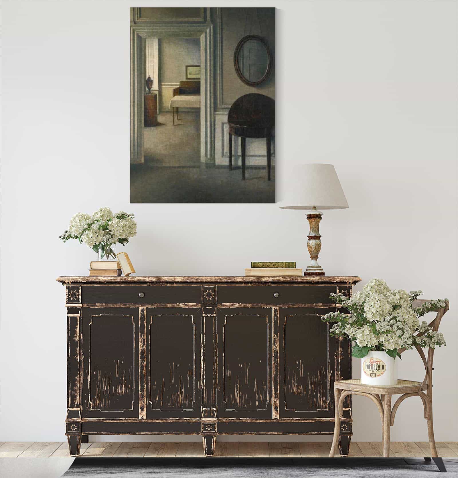 Interior With A Mirror by Vilhelm Hammershoi