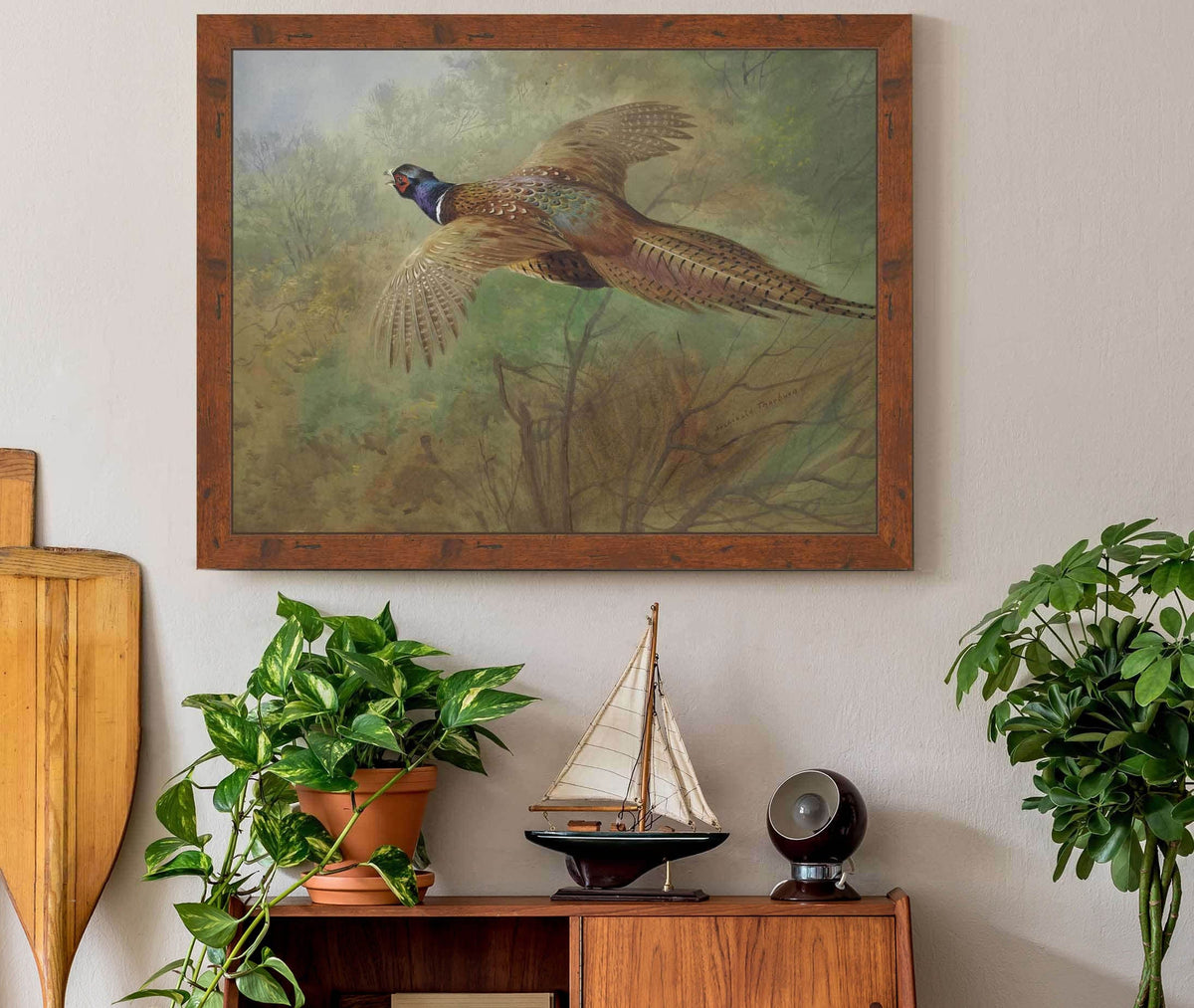 Pheasant In Flight by Archibald Thorburn
