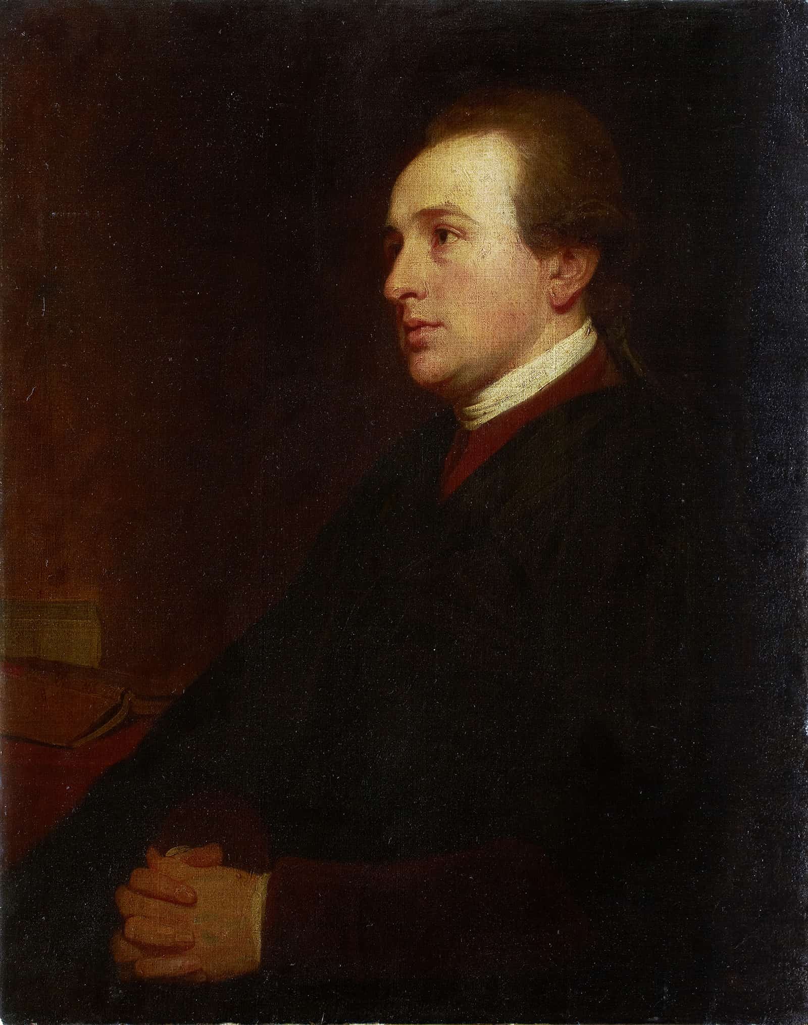 Portrait Of A Young Man At His Desk Ca by George Romney