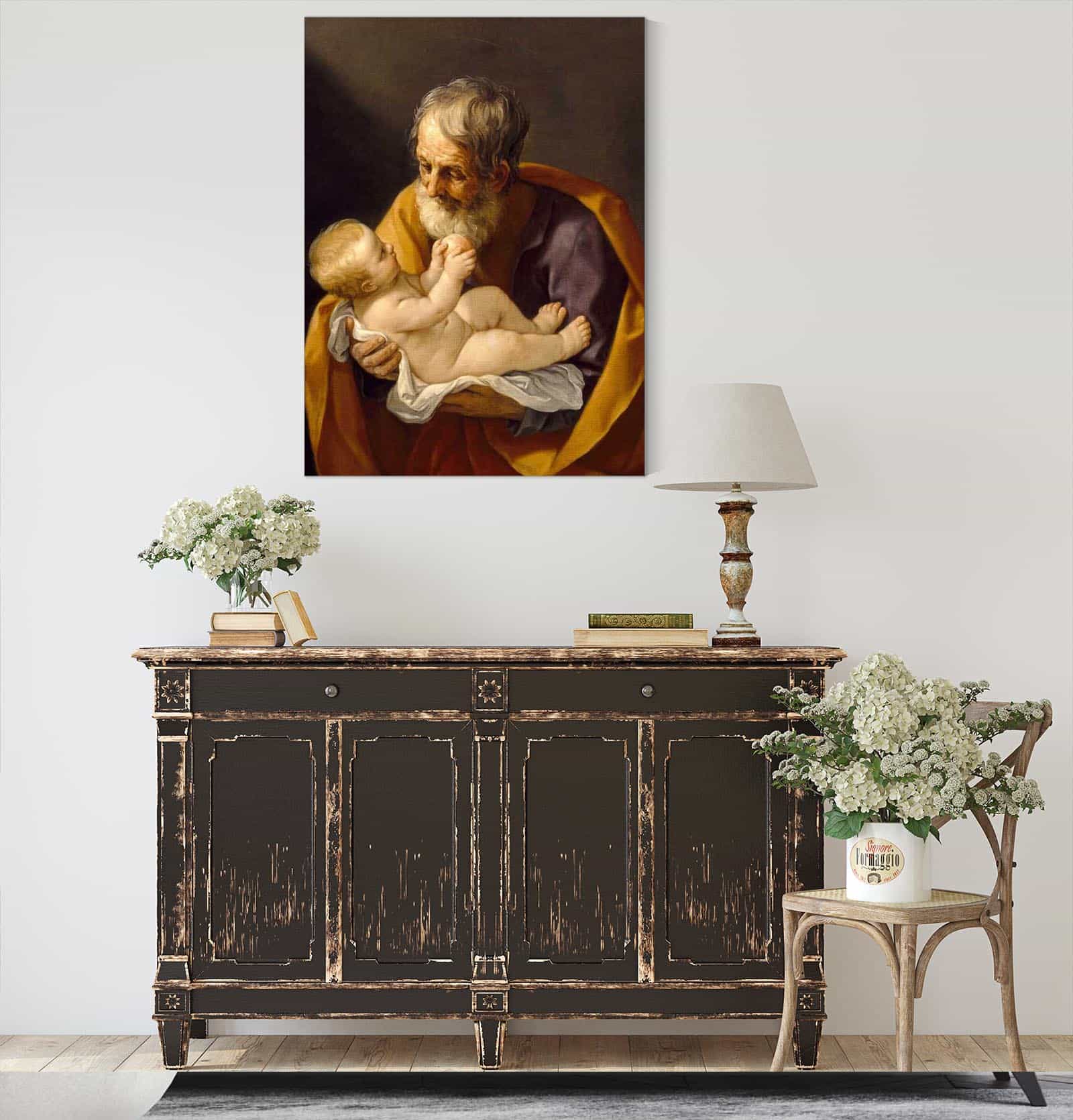 Saint Joseph And The Christ Child by Guido Reni