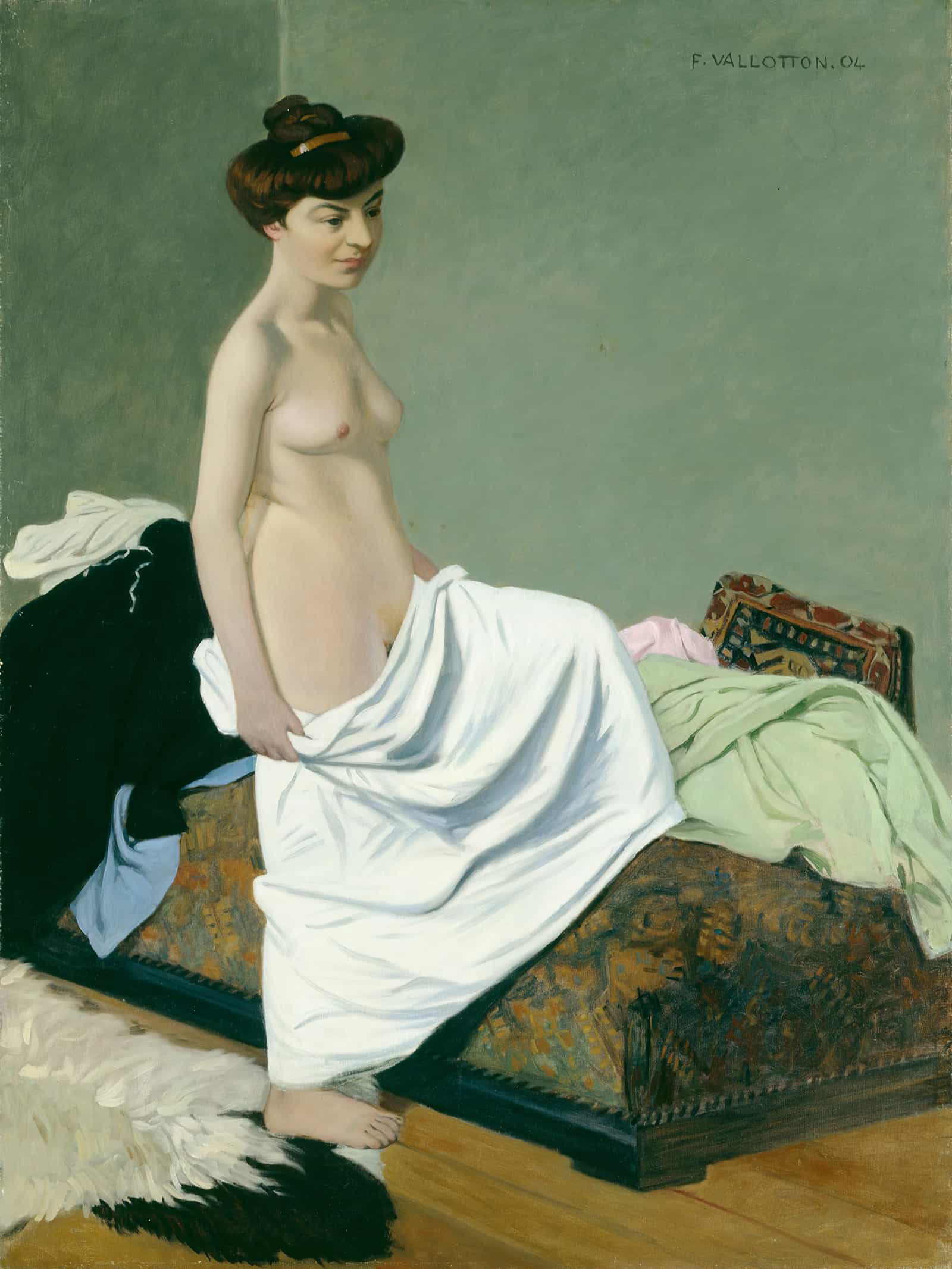 Standing Nude Holding Gown On Her Knee by Felix Vallotton