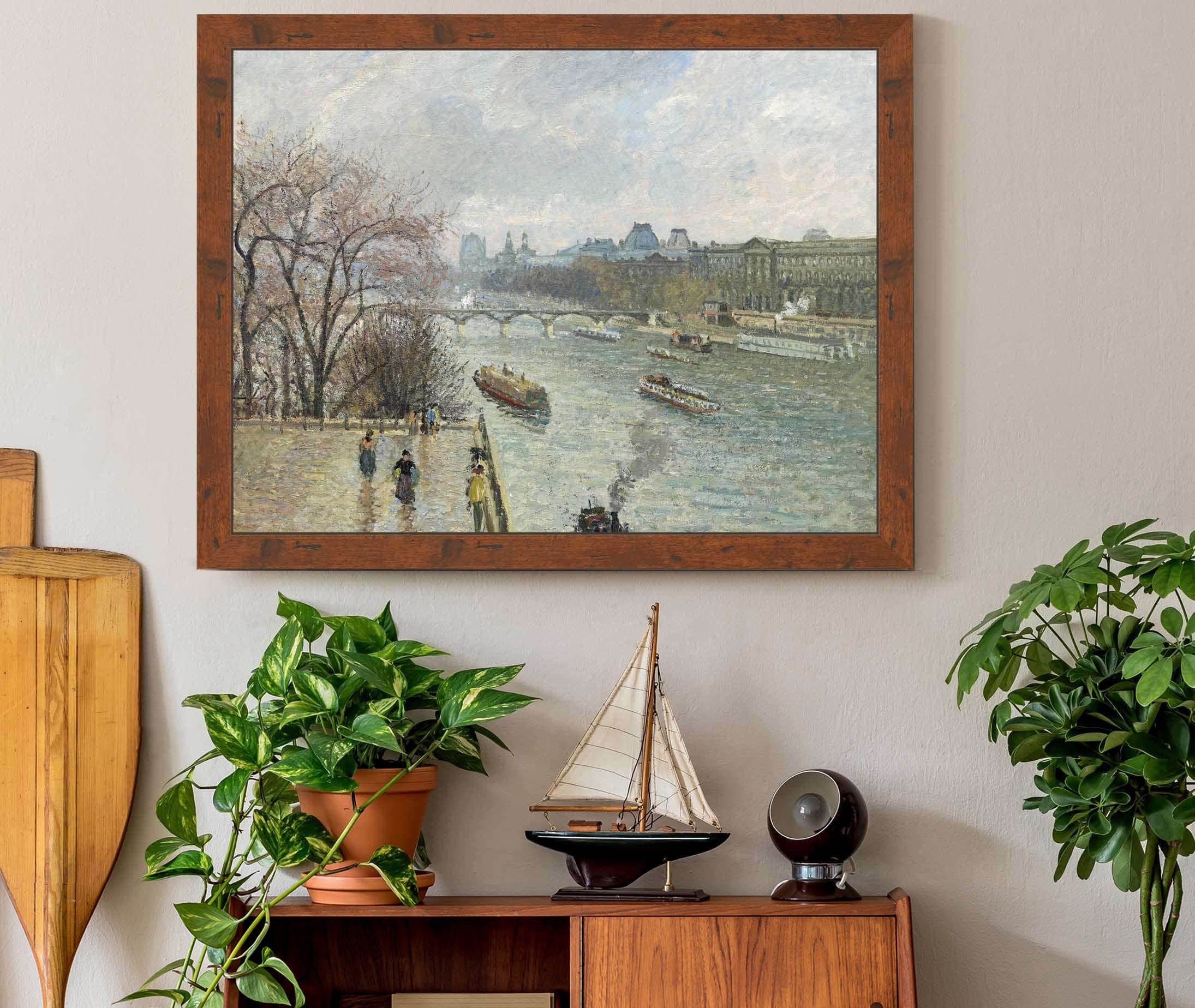 The Louvreafternoon Rainy Weather by Camille Pissarro