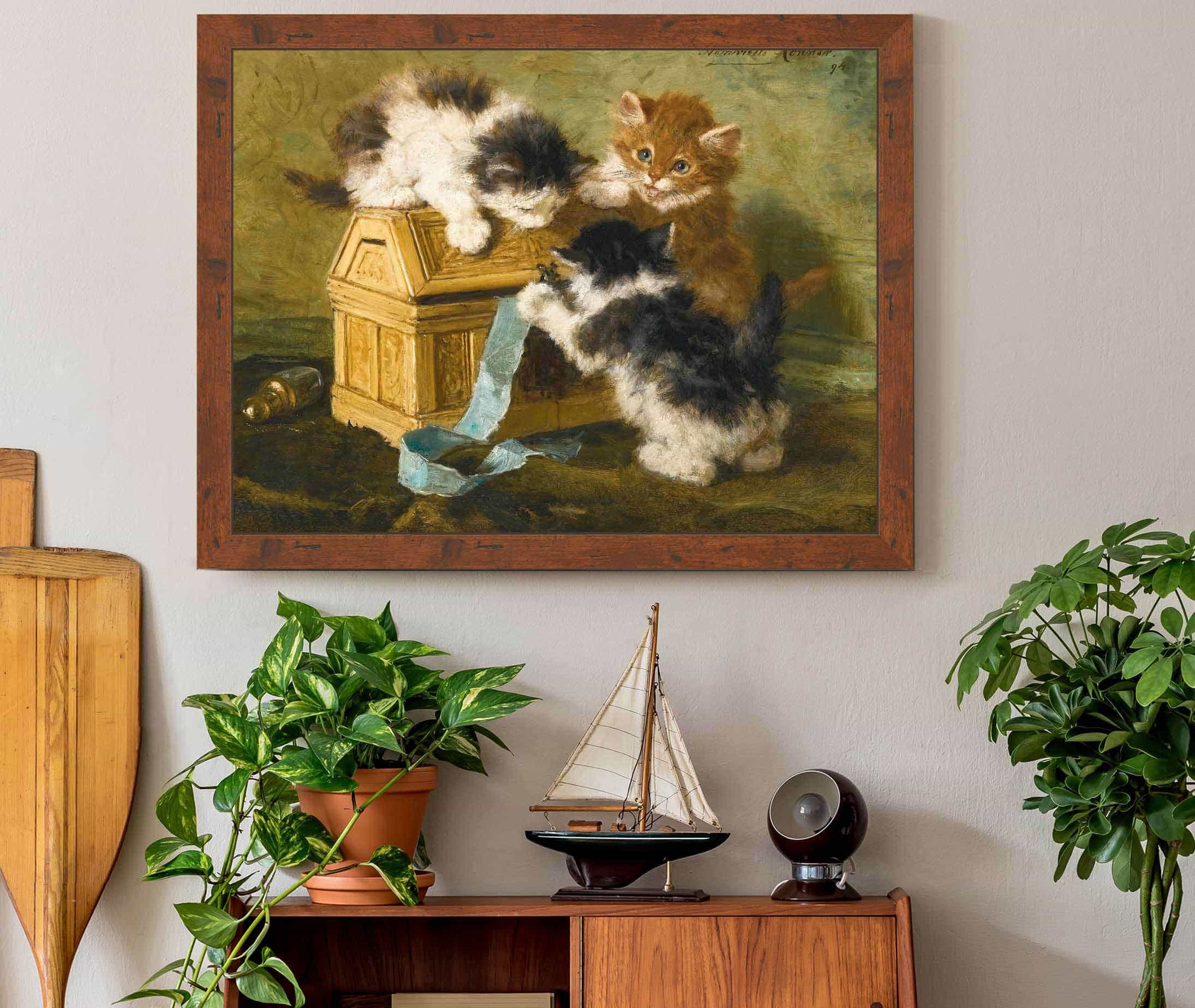 Three Kittens With A Casket And Blue Ribbon by Henriette Ronner Knip