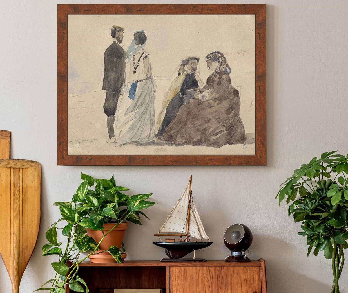 Two Ladies Seated And A Couple Walking On The Beach by Eugene Boudin