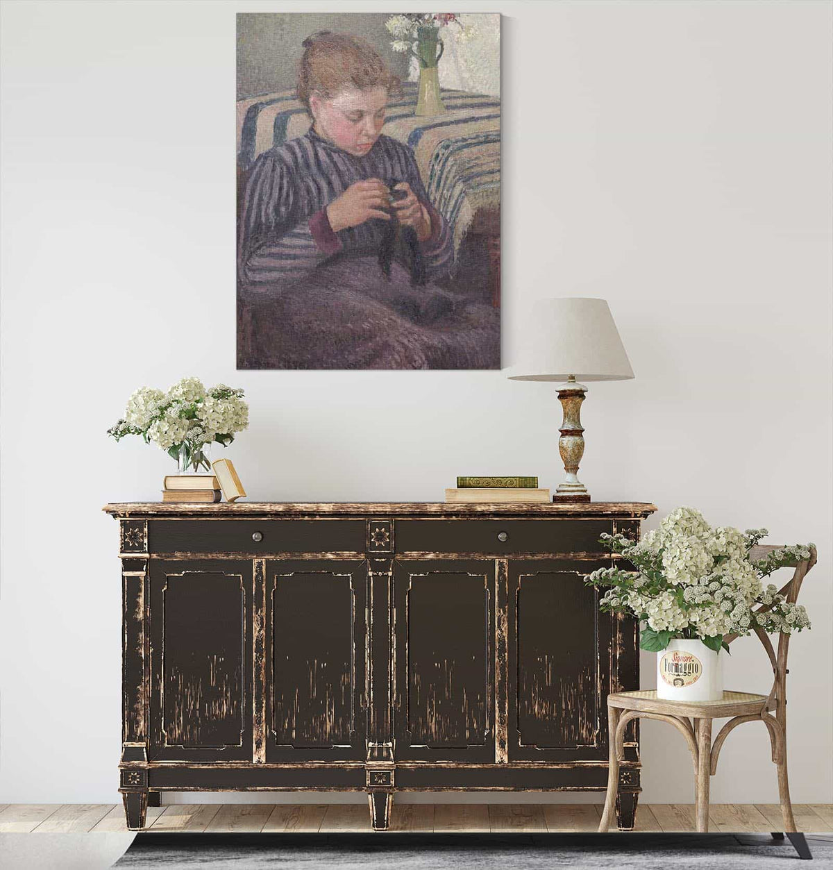 Woman Mending by Camille Pissarro