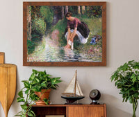 Woman Washing Her Feet In A Brook by Camille Pissarro